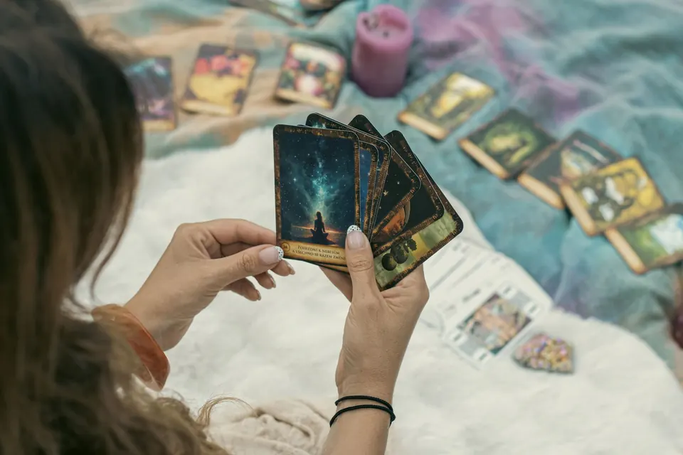 A tarot spread laid out on a blanket — the tools of the craft
